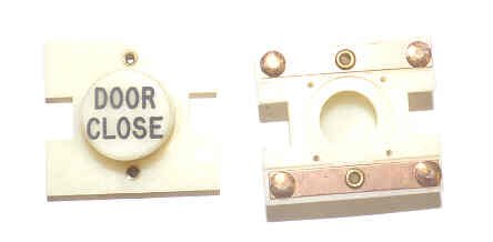 PRESSEL, BUTTON, MONITOR, WHITE WITH BLACK MARKING DOOR CLOSE