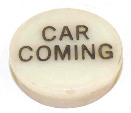 JEWEL, WHITE, MARKED CAR COMING IN BLACK MOULDED, 15/16 O.D., 7/8 I.D.