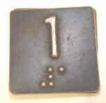 PLATE, BRAILLE, SELF ADHESIVE, 1 1/4 SQUARE MARKED 1