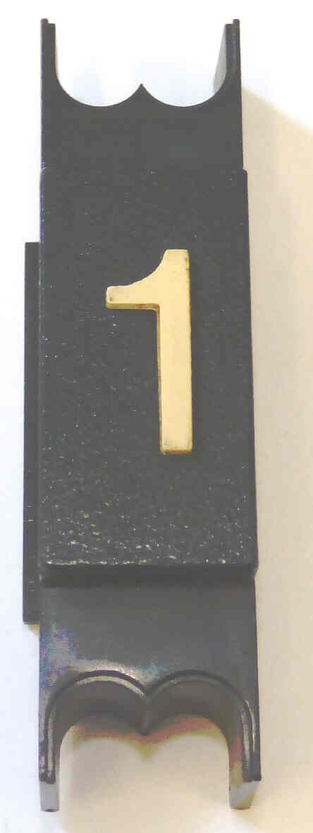 SPACER, .625 WIDE, BLACK, MARKED # 1, WITH BRAILLE