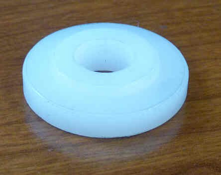 INSULATOR, 1 1'2 X 1/4 BASE, 1 X 1/8 BOSS, 1/2 HOLE