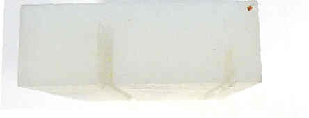GUIDE, TAPE, MACHINED PLASTIC, USED ON STS-1 LEVELING UNITS