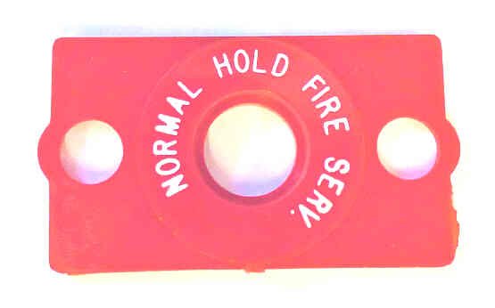 BEZEL. RED, FIRE SERVICE, MARKED NORMAL-HOLD-FIRE SERVICE