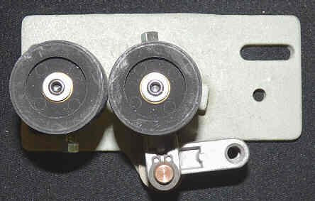 ASSEMBLY, RELEASE, ROLLER. IRON BASE FOR MOM INTERLOCKS LH GAL # INT-9-LH