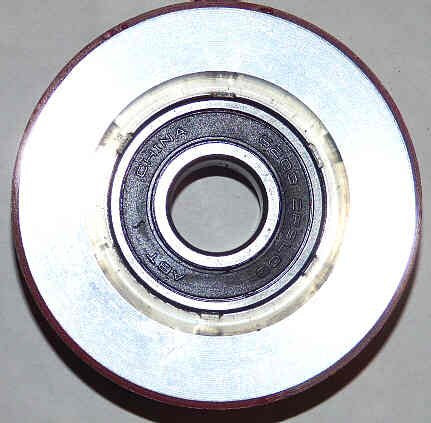 ROLLER, HANGER, CONCAVE, 2 29/32 DIA, .6693 BORE SCHINDLER 7433C56H01