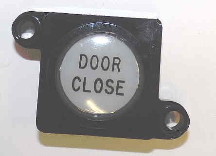 BUTTON, CAP, HALO AND ADAPTER. MARKED DOOR CLOSE ADAMS # ASA452A-DC