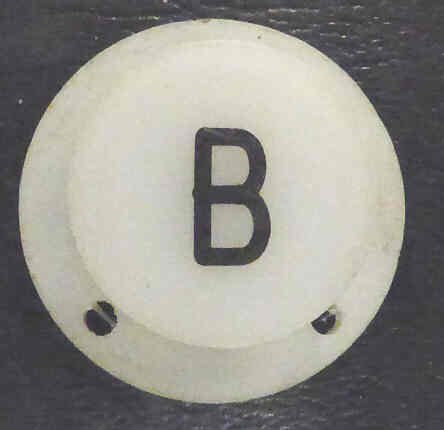 BUTTON, ELEMENT, WHITE, ROUND, ENGRAVED 'B' GAL # PB1-0654N