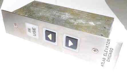 STATION, HALL, WITH UP & DOWN BUTTONS AND IN USE JEWEL ENGRAVED ATLAS ELEVATOR