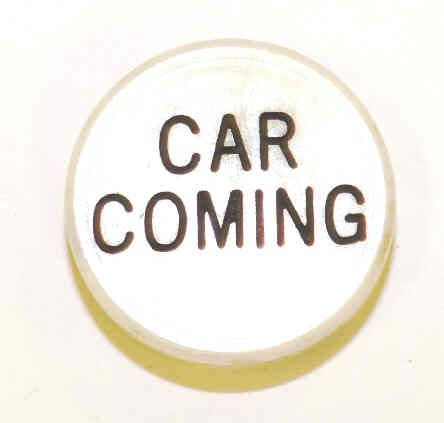 JEWEL, WHITE, MARKED CAR COMING IN BLACK MOULDED, 15/16 O.D., 7/8 I.D.