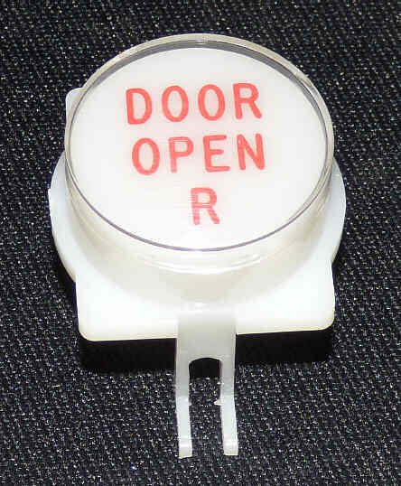 BUTTON, EXTENDED CAP FOR CALIFORNIA, A LINE CAR BUTTON DOOR OPEN REAR IN RED