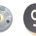 BUTTON, 7/8, BLACK, HOT STAMPED IN WHITE, MARKED 6 OTIS # 323BL2