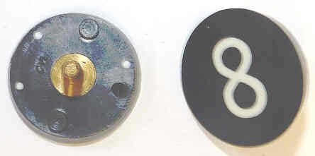 BUTTON, 7/8, BLACK, HOT STAMPED IN WHITE, MARKED 8 OTIS # 323BL2