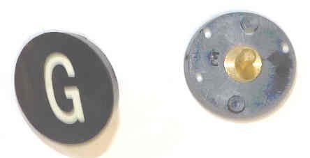 BUTTON, 7/8, BLACK, HOT STAMPED IN WHITE, MARKED G OTIS # 323BL2