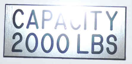 PLATE, CAPACITY, 2000 POUND, STAINLESS FINISH, SELF ADHESIVE 3 1/2 X 1 1/2