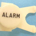 BUTTON, WHITE, ENGRAVED, BLACK ALARM DOVER # 106734