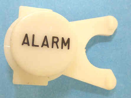BUTTON, WHITE, ENGRAVED, BLACK ALARM DOVER # 106734