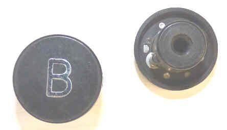 BUTTON, 7/8 DIAMETER, MARKED 'B' OTIS # A323AF1-B
