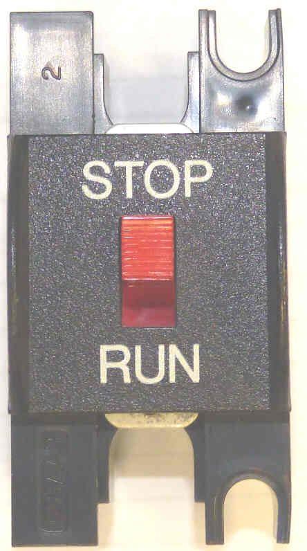 SWITCH, STOP, SLIDING, MARKED STOP/RUN DOVER # 9810158