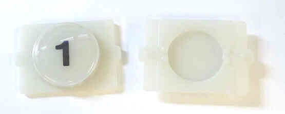 BUTTON, E LINE, WAFER, CLEAR CAP, MARKED 1 IN BLACK WESTINGHOUSE # 323C855H01
