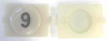 BUTTON, E LINE, WAFER, CLEAR CAP, MARKED 9 IN BLACK WESTINGHOUSE # 323C855H09