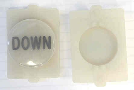 BUTTON, E LINE, CLEAR CAP, MARKED DOWN IN BLACK WESTINGHOUSE # 323C854H17