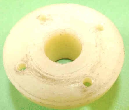BUSHING, PLASTIC, MACHINED AND DRILLED, AS SHOWN PEELLE # 093424
