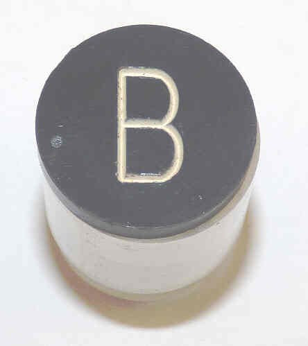 BUTTON, BLACK, ENGRAVED 'B' DOVER # 9852529