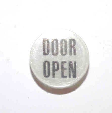 INSERT, BUTTON, 7/8 DIA., WHITE, MARKED DOOR OPEN IN BLACK ARMOR # 11133-01