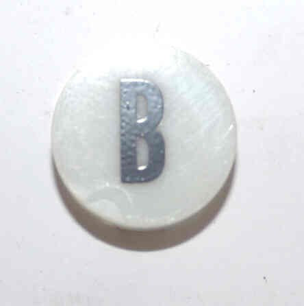 INSERT, BUTTON, 7/8 DIA., WHITE, MARKED B IN BLACK ARMOR # 11133-01