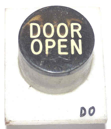 BUTTON, WHITE, ENGRAVED DOOR OPEN IN BLACK SERGE # A-2