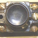 BUTTON, BLACK, BLANK, USED ON EARLY SERGE HALL STATIONS MARKING A100-44061A