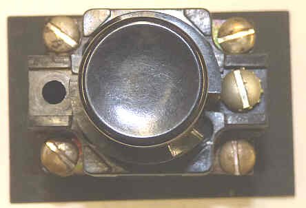 BUTTON, BLACK, BLANK, USED ON EARLY SERGE HALL STATIONS MARKING A100-44061A