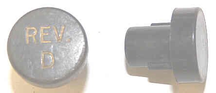 BUTTON, 7/8 DIAMETER, MARKED 'REV D' OTIS # A323AF1-REV D
