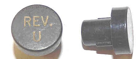 BUTTON, 7/8 DIAMETER, MARKED 'REV U' OTIS # A323AF1-REV U