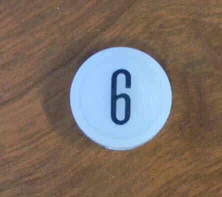 INSERT, BUTTON, 7/8 DIA., WHITE, MARKED # 6/9 IN BLACK ARMOR # 11133-01