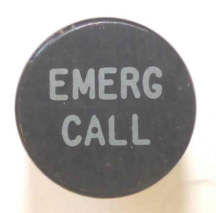 BUTTON, 7/8 DIAMETER, MARKED 'EMERG CALL' OTIS # A323AF1-EC