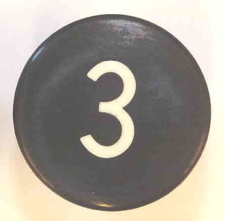 BUTTON, BLACK, MARKED # 3, 1 DIAMETER OTIS # 323BD1-3