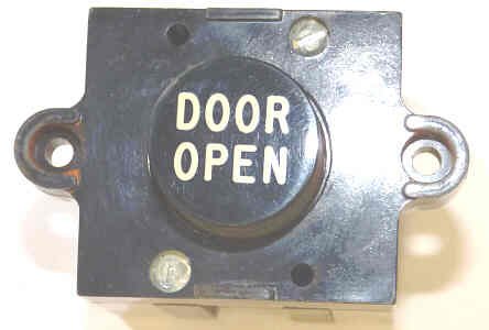 ASSEMBLY, BUTTON, BLACK, MARKED DOOR OPEN