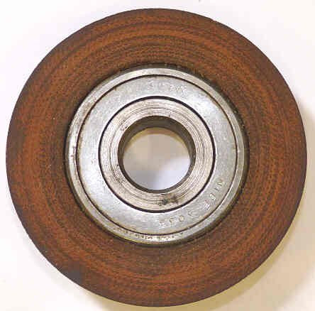 ROLLER, GATE, MICARTA, CONCAVE,USED ON GATE SHEAVE ASSY DOVER # E40006 B