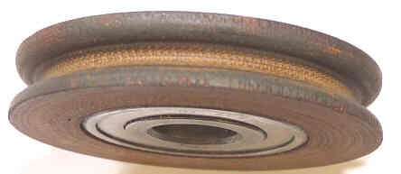 ROLLER, GATE, MICARTA, CONCAVE,USED ON GATE SHEAVE ASSY DOVER # E40006 B