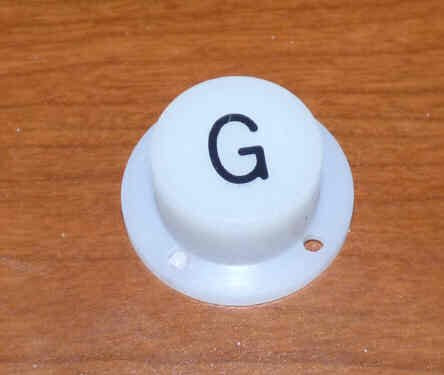 BUTTON, ELEMENT, WHITE, ROUND, ENGRAVED 'G'