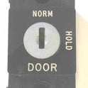 SWITCH, KEYED, BLACK BEZEL, VERTICAL, ENGRAVED NORM-HOLD-DOOR