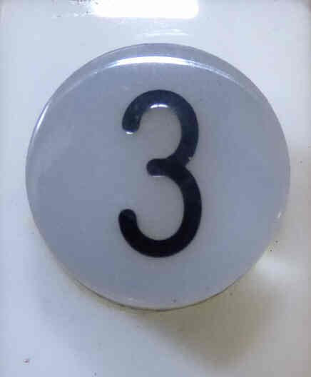 BUTTON, WHITE, ENGRAVED # 3 IN BLACK SERGE # A-2