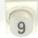 BUTTON, WHITE, ENGRAVED # 9 IN BLACK SERGE # A-2
