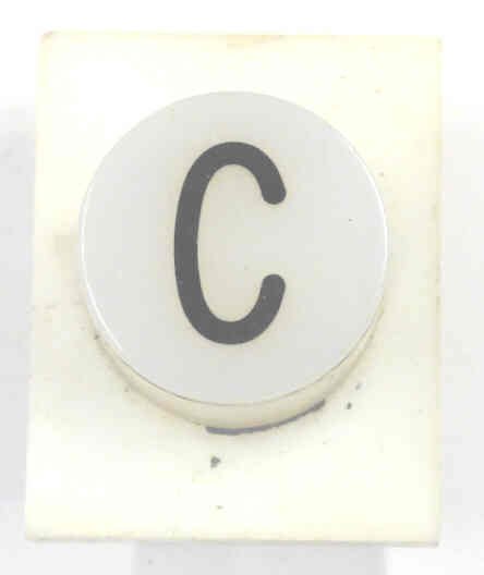 BUTTON, WHITE, ENGRAVED 'C' IN BLACK SERGE # A-2