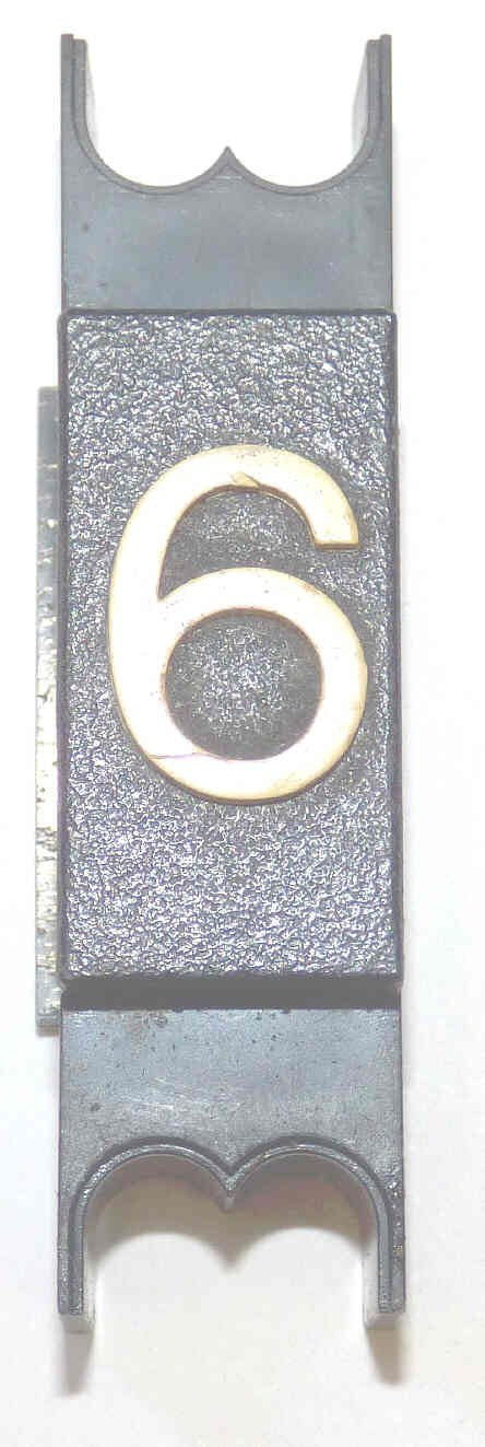 SPACER, .625  WIDE, BLACK, WITHOUT BRAILLE, MARKED # 6 DOVER # 9893600
