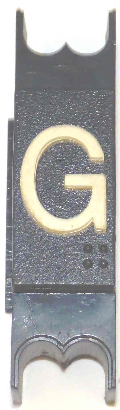 SPACER, .625  WIDE, BLACK, WITH BRAILLE, MARKED G DOVER # 9893740