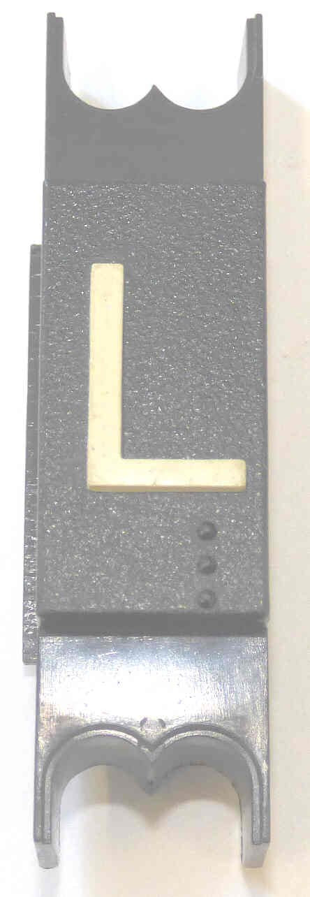 SPACER, .625  WIDE, BLACK, WITH BRAILLE, MARKED L DOVER # 9893714