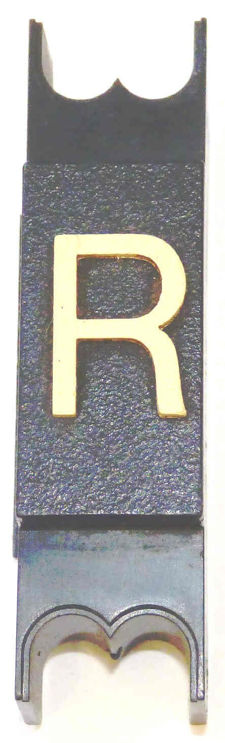 SPACER, .625  WIDE, BLACK, WITHOUT BRAILLE, MARKED R