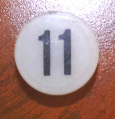 INSERT, BUTTON, 7/8 DIA., WHITE, MARKED # 11 IN BLACK ARMOR # 11133-01